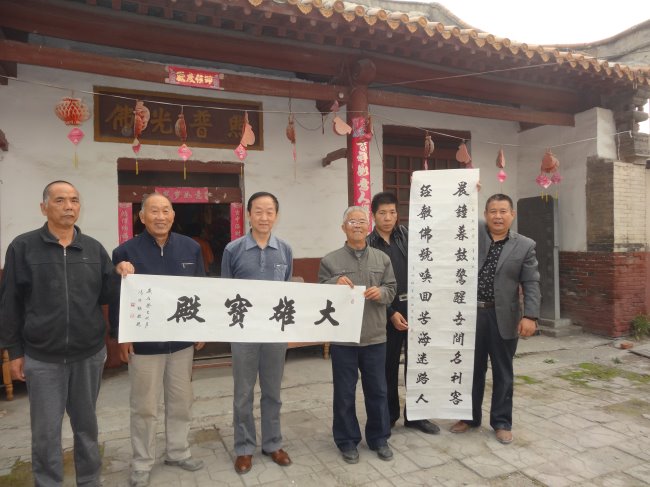 冯栋梁先生为河北省会三教堂即将建成的大雄宝殿题写牌匾以及门柱对联.jpg